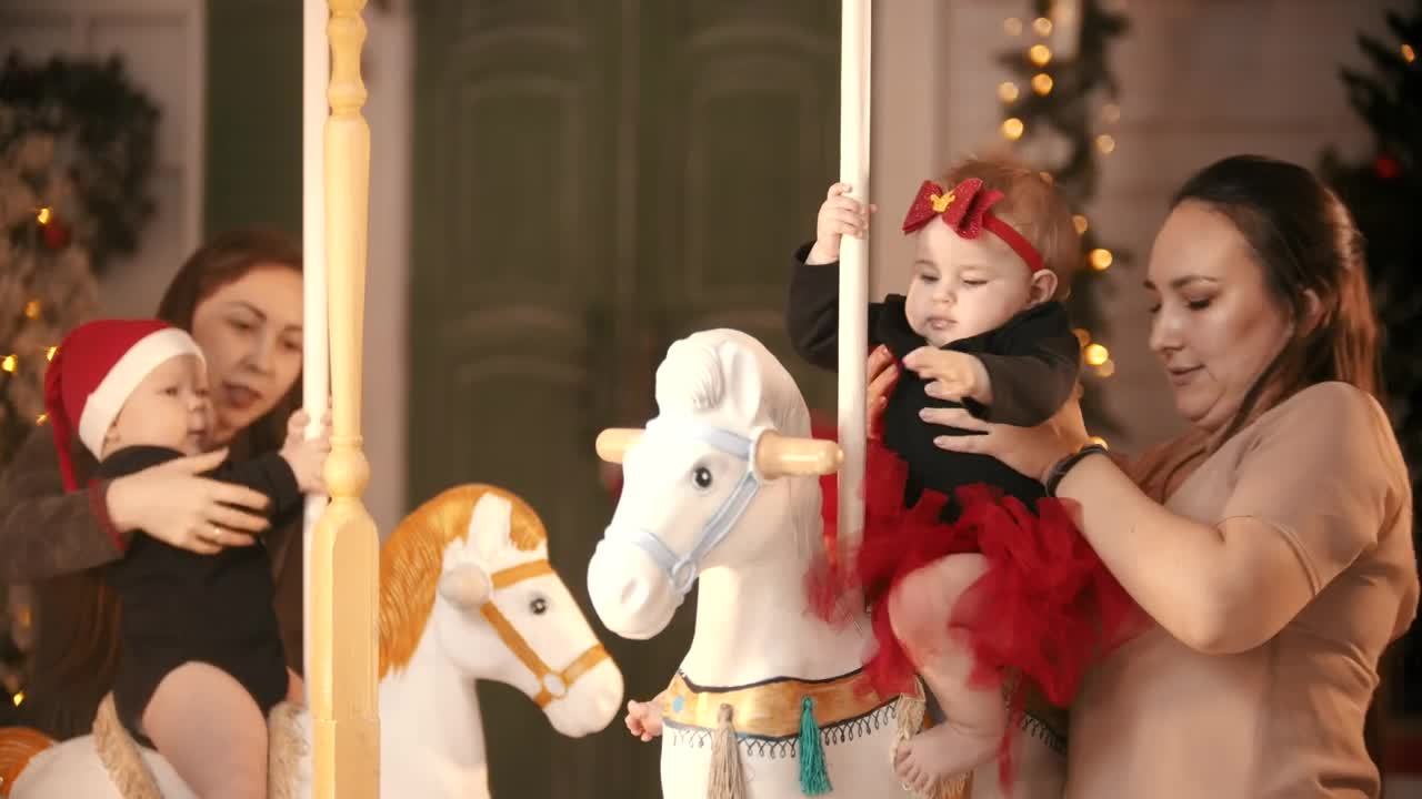 Stock Video Mothers With Their Daughters On A Christmas Carousel Live Wallpaper