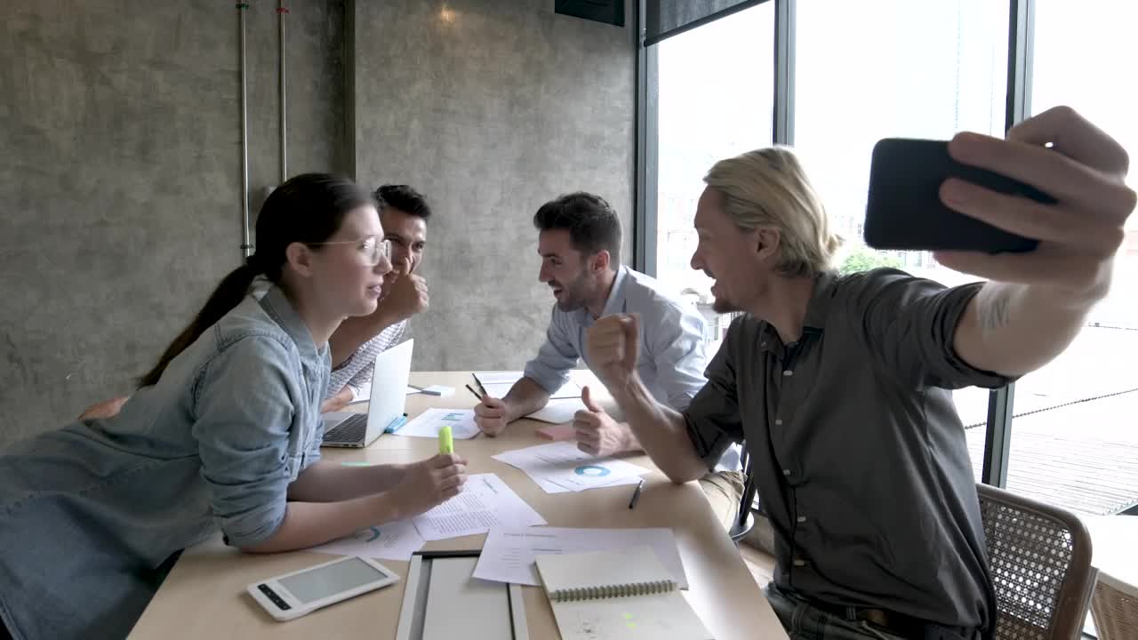 Stock Video Motivated Work Team Taking A Selfie Live Wallpaper