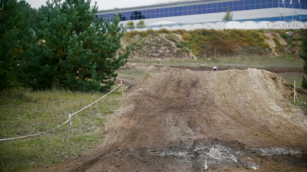 Stock Video Motocross Racer Landing On Dirt Live Wallpaper