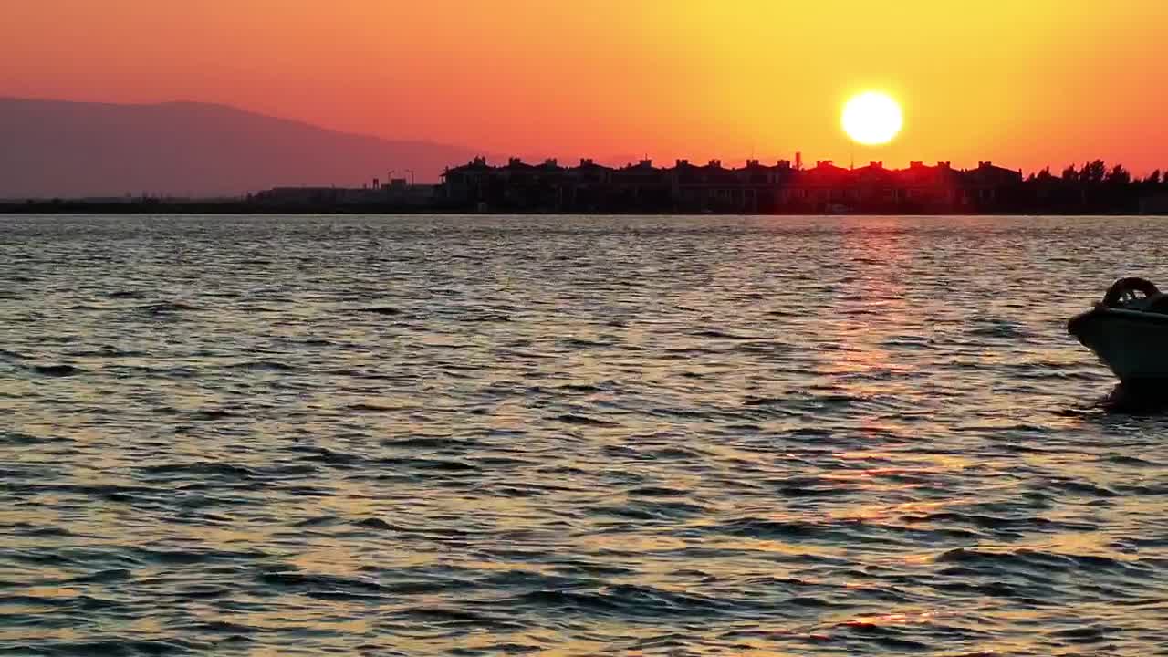 Stock Video Motorboat Sailing At Sunset Live Wallpaper