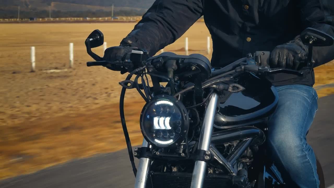 Stock Video Motorcycle Of A Man Speeding On A Road Live Wallpaper