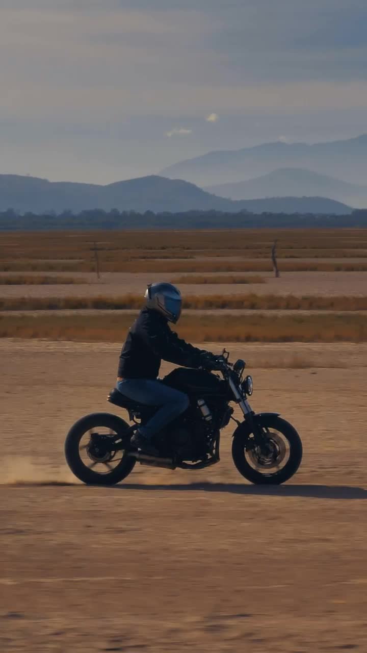 Stock Video Motorcyclist Speeding Through A Desert Live Wallpaper
