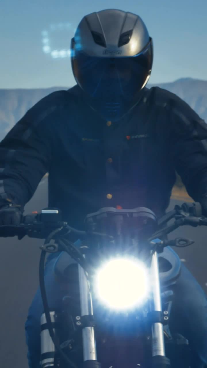 Stock Video Motorcyclist Traveling Fast In A Close Shot Live Wallpaper