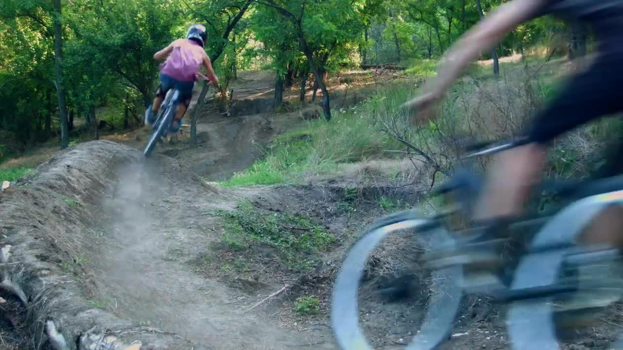 Stock Video Mountain Cyclists On The Path Live Wallpaper