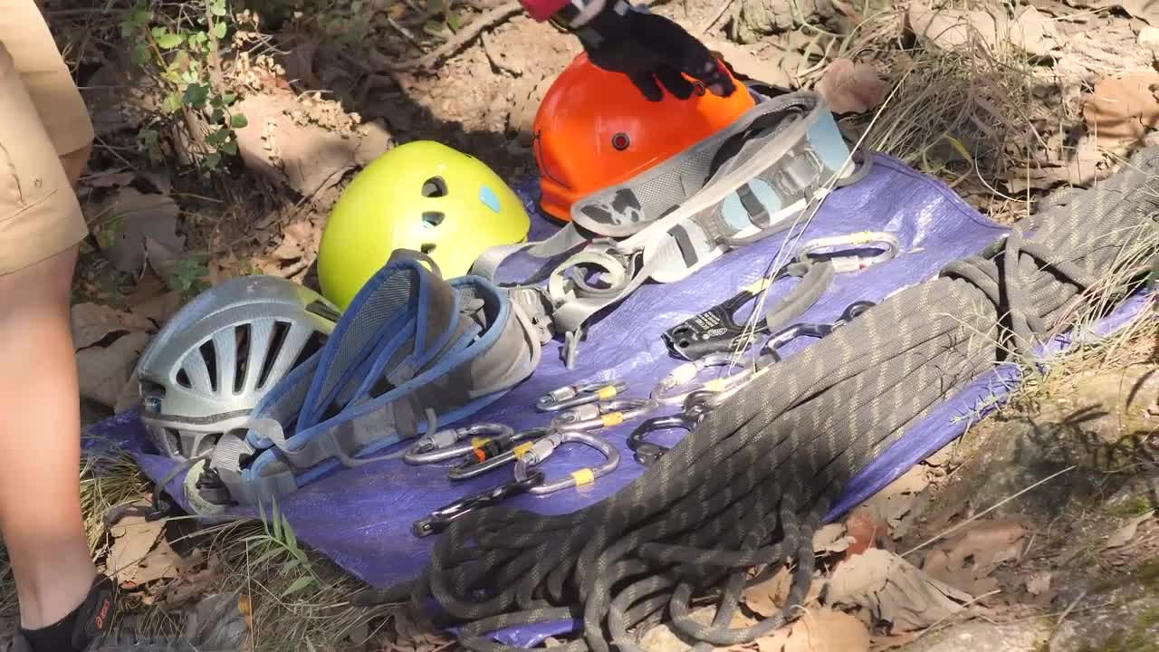 Stock Video Mountaineer Man Preparing His Safety Equipment Live Wallpaper