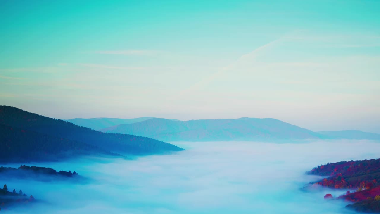 Stock Video Mountainous Autumn Landscape Covered In Mist Live Wallpaper