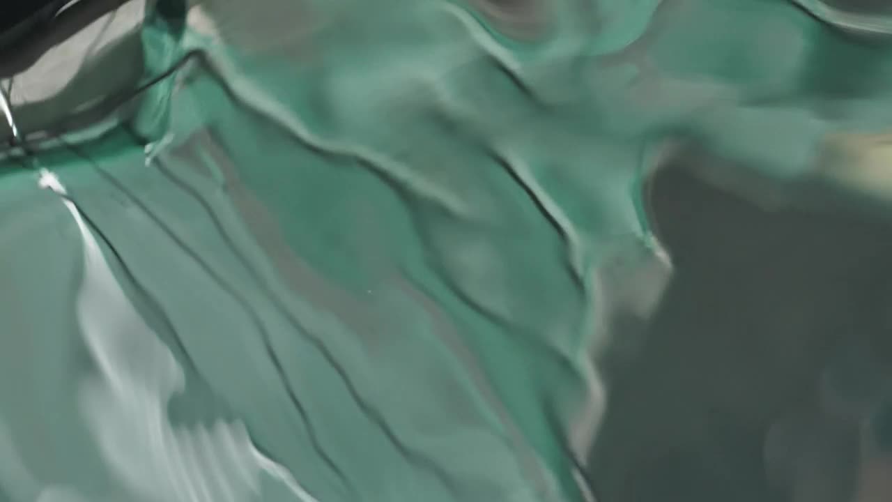 Stock Video Movement In The Water While Reflecting Colors Live Wallpaper