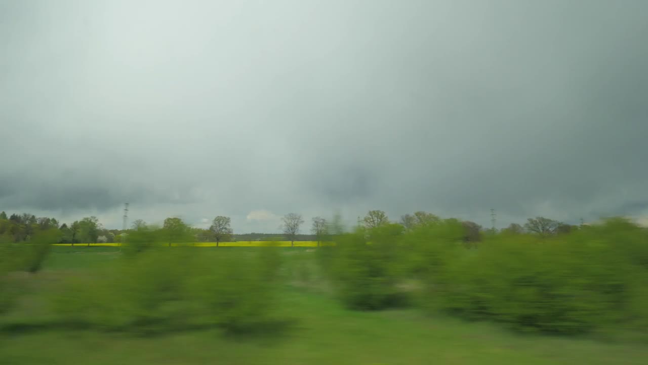 Stock Video Moving By The Countryside From A Train Live Wallpaper