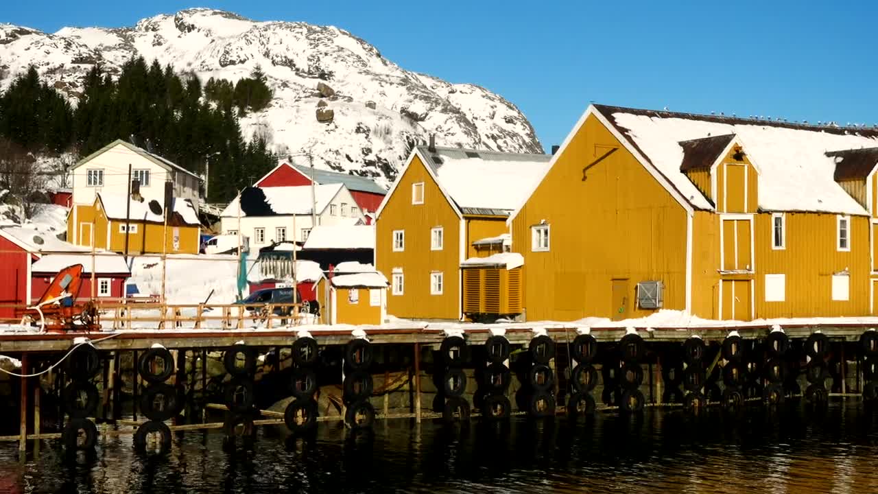 Stock Video Multi Colored Wooden Fishing Houses And Pier Live Wallpaper