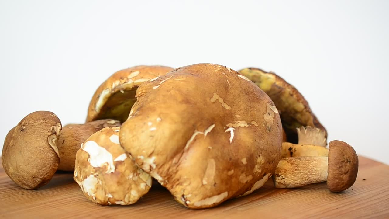 Stock Video Mushrooms Spinning On A Wooden Table Live Wallpaper