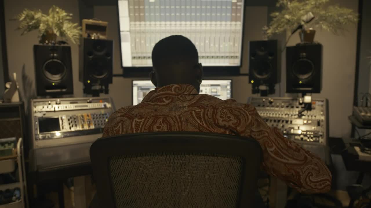 Stock Video Music Producer Dancing While Working In A Studio Live Wallpaper