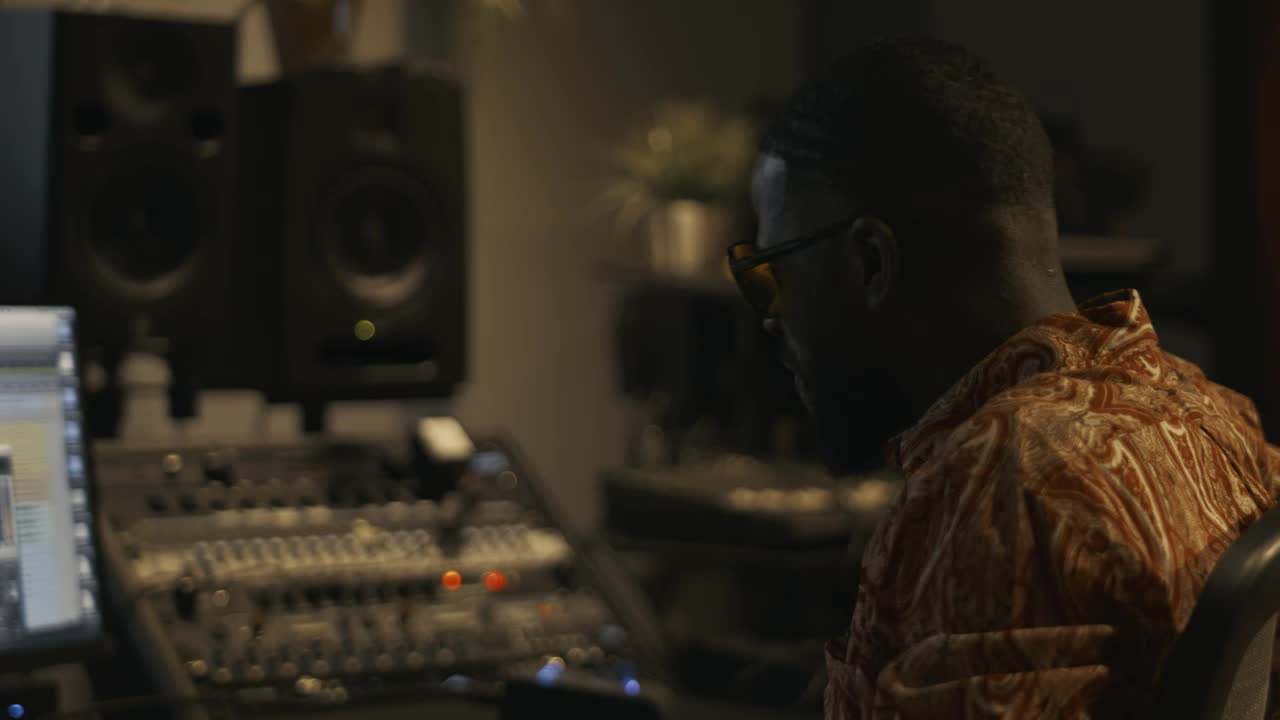 Stock Video Music Producer Working In A Studio Live Wallpaper