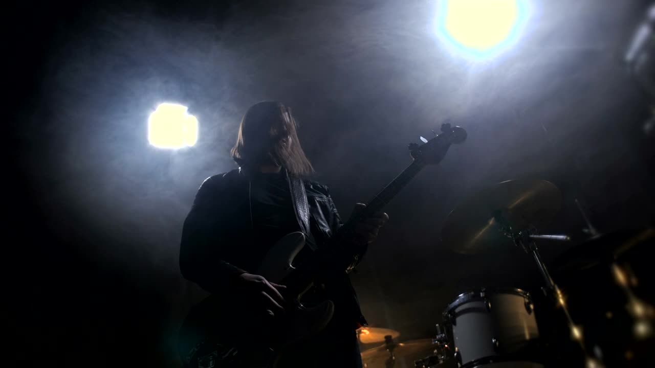 Stock Video Musician Playing A Guitar In A Small Club Live Wallpaper