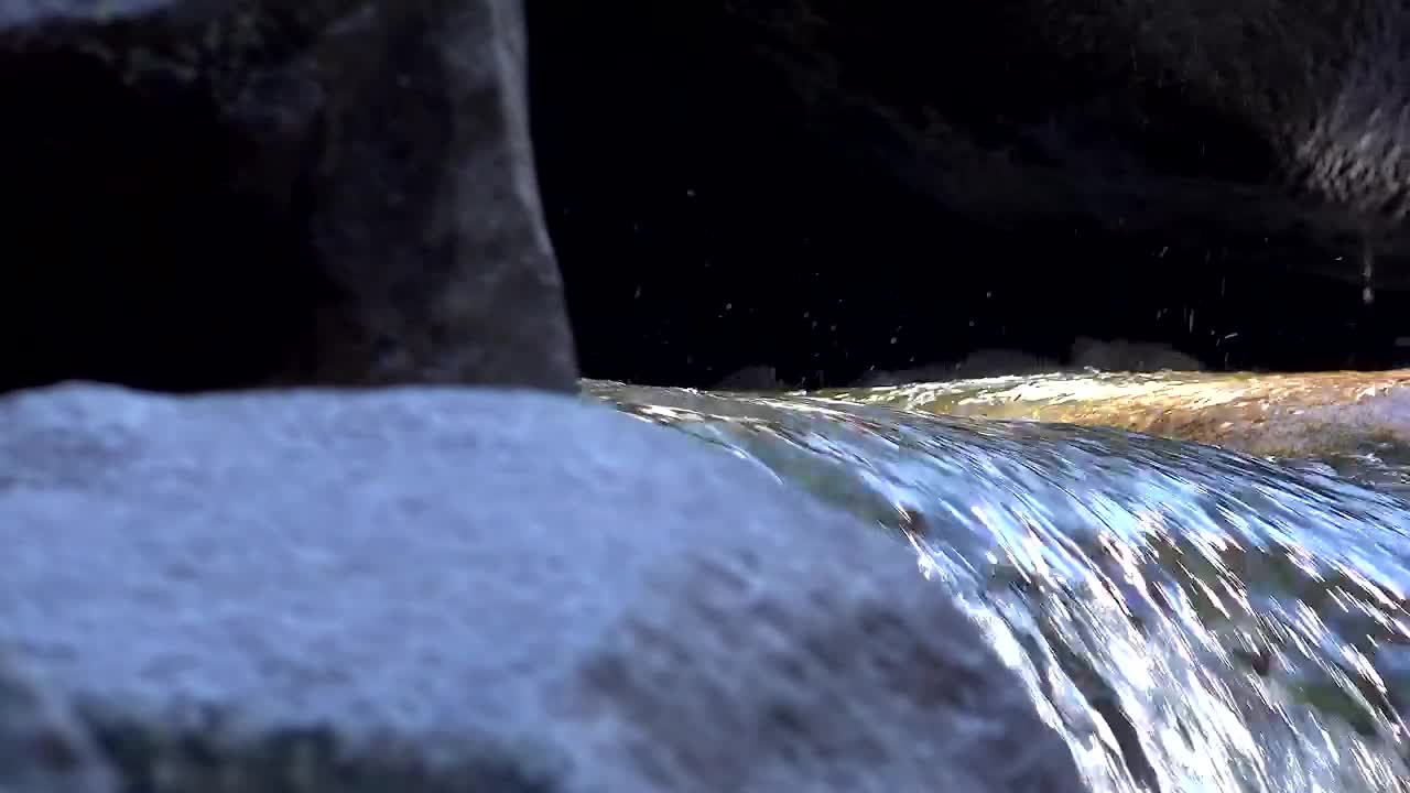 Stock Video Natural Spring Water Flowing On The Rocks Live Wallpaper