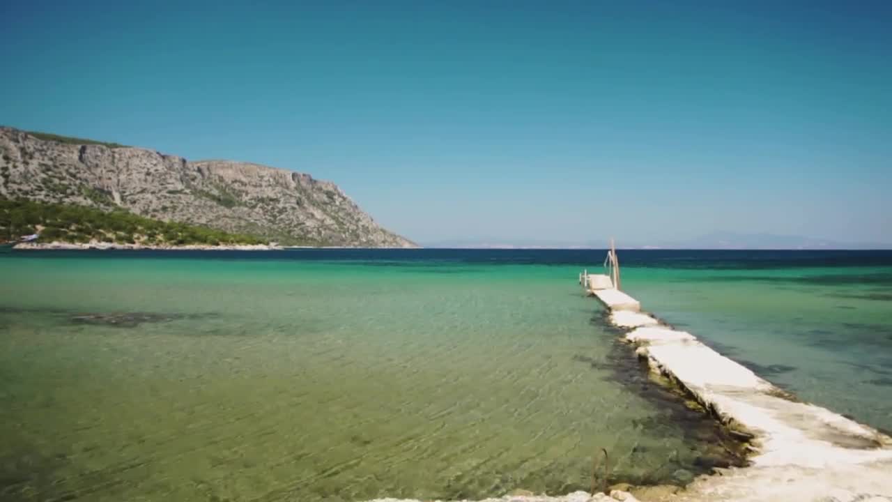 Stock Video Natural Stone Pier At The Beach Live Wallpaper