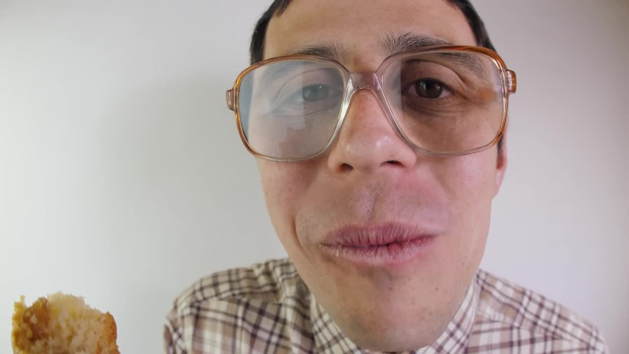 Stock Video Nerdy Man Eating Portrait Live Wallpaper