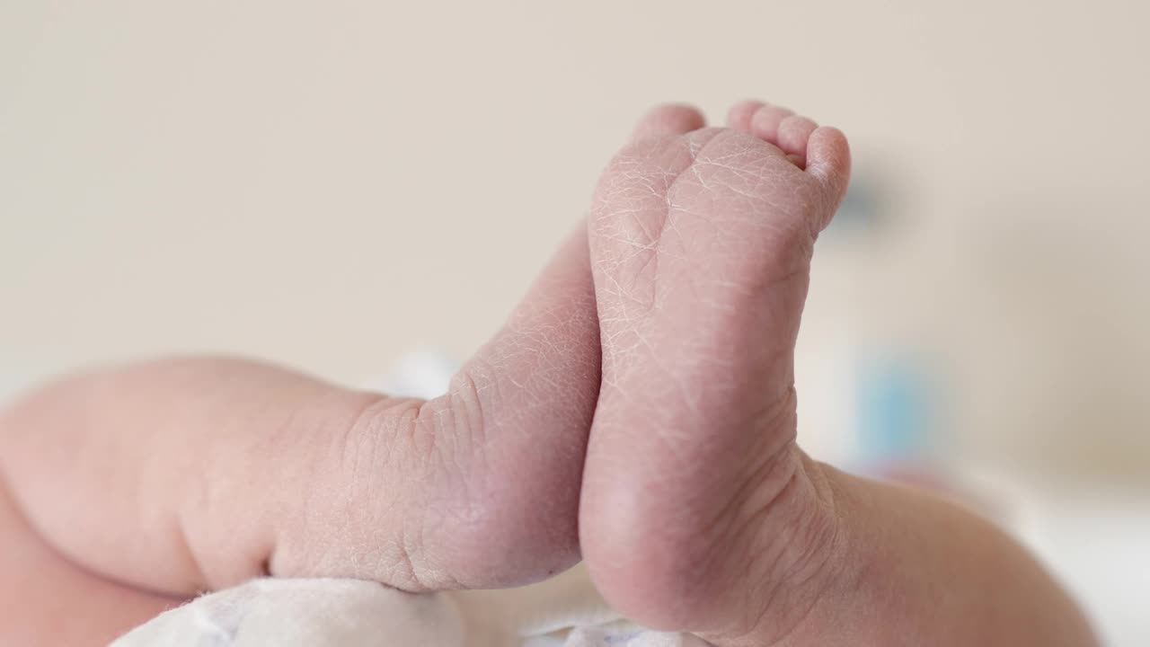 Stock Video Newborn Baby Laying On A Table Live Wallpaper