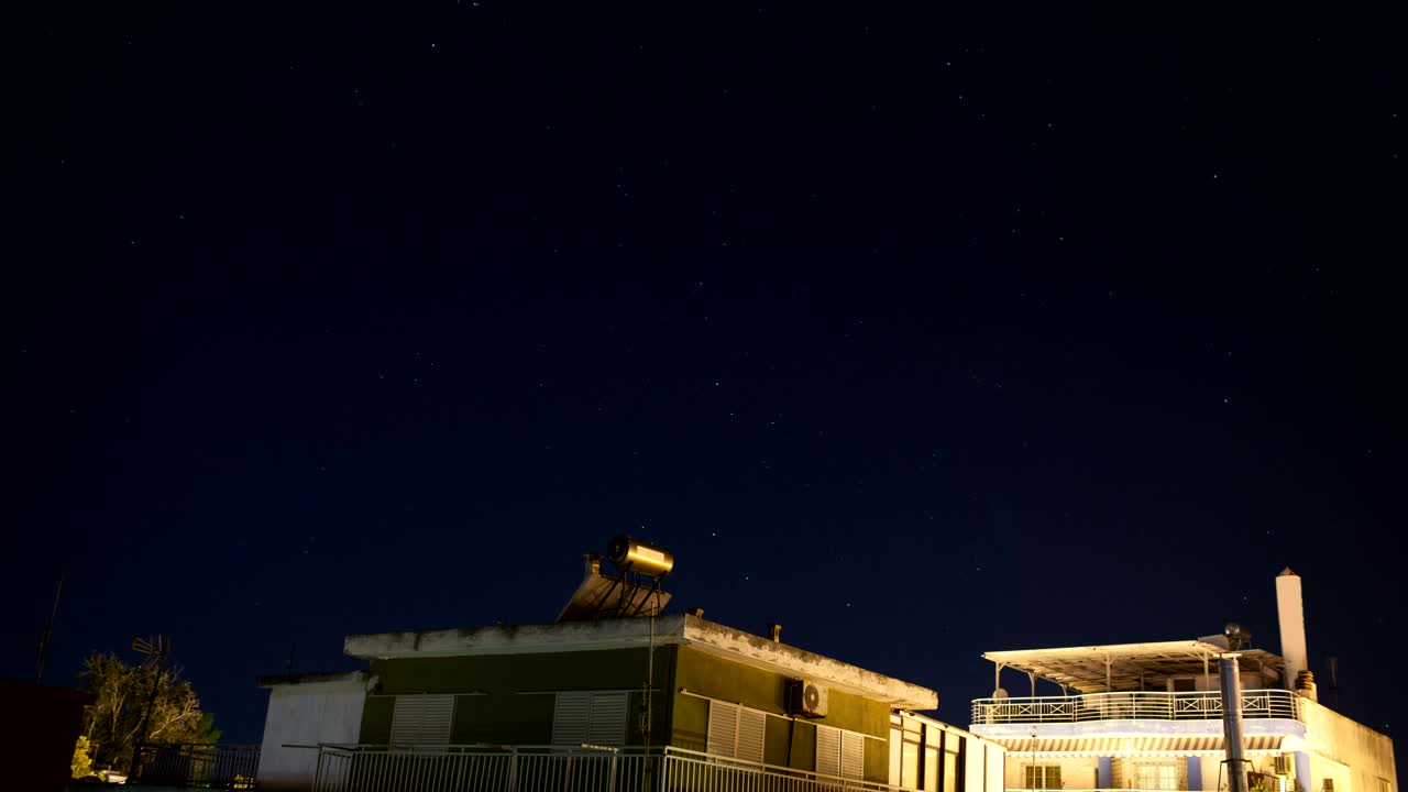 Stock Video Night Sky Above Small Houses Live Wallpaper