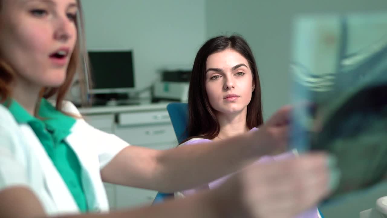 Stock Video Nurse Shows Patient X Ray In Hospital Room Live Wallpaper