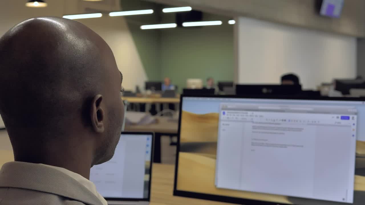 Stock Video Office Person Working On A Computer Live Wallpaper