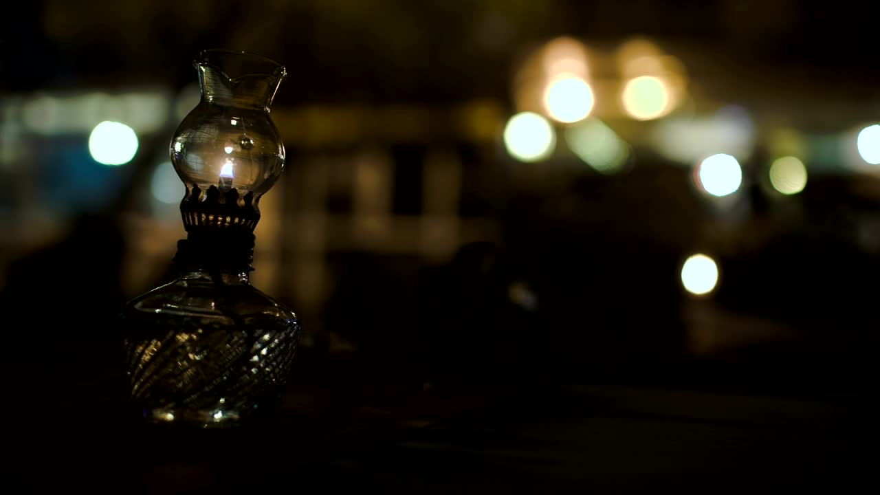 Stock Video Oil Lantern On A Cafe Table Live Wallpaper
