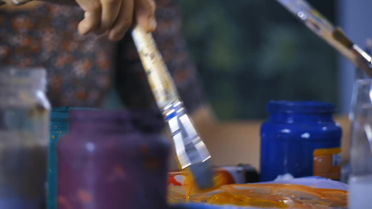 Stock Video Oil Painter Working With A Brush Live Wallpaper