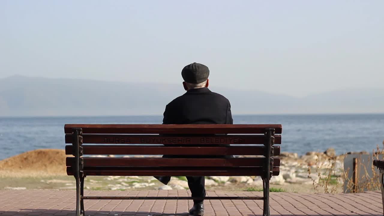 Stock Video Old Aged Man Relaxing In Front Of The Sea Live Wallpaper
