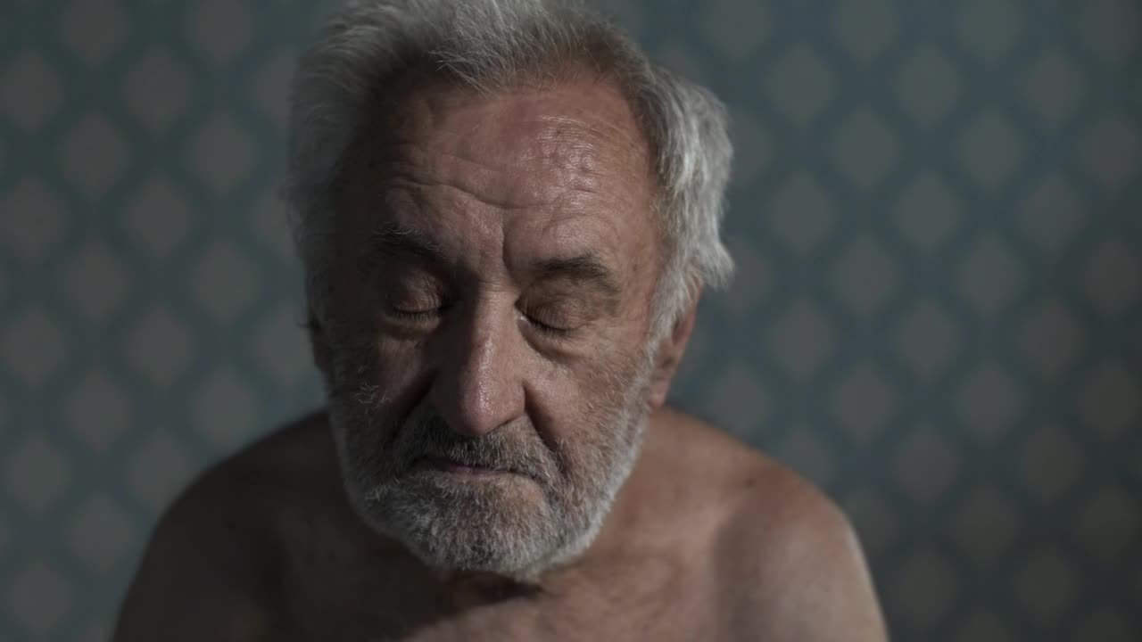 Stock Video Old And Depressed Man Portrait Live Wallpaper