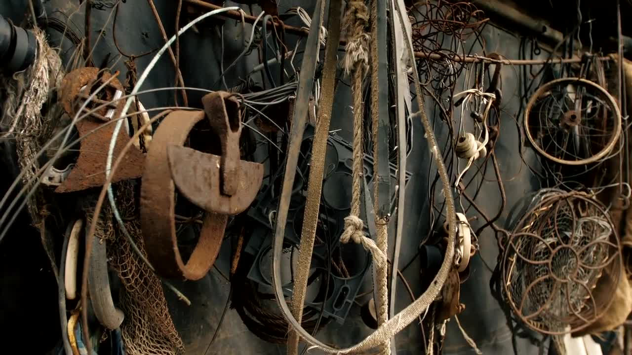Stock Video Old Metal Items Hanging On The Wall Live Wallpaper