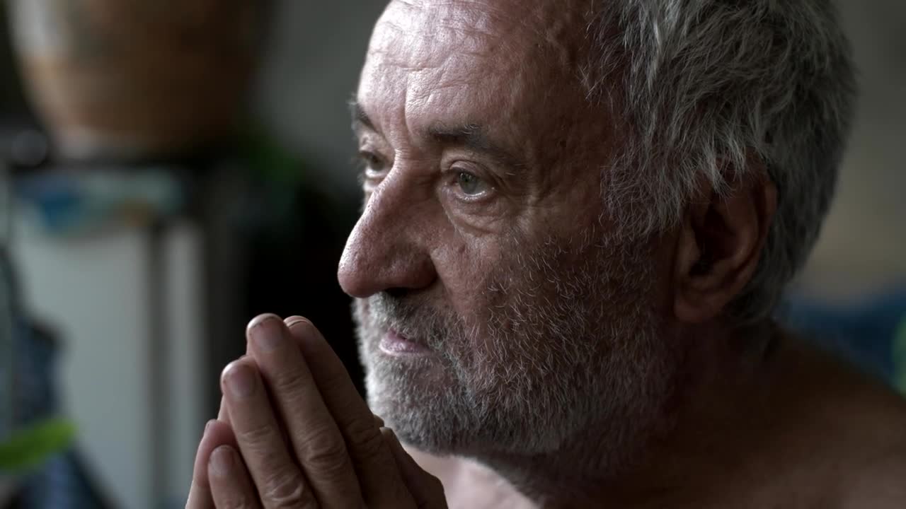 Stock Video Old Poor Man Praying Live Wallpaper