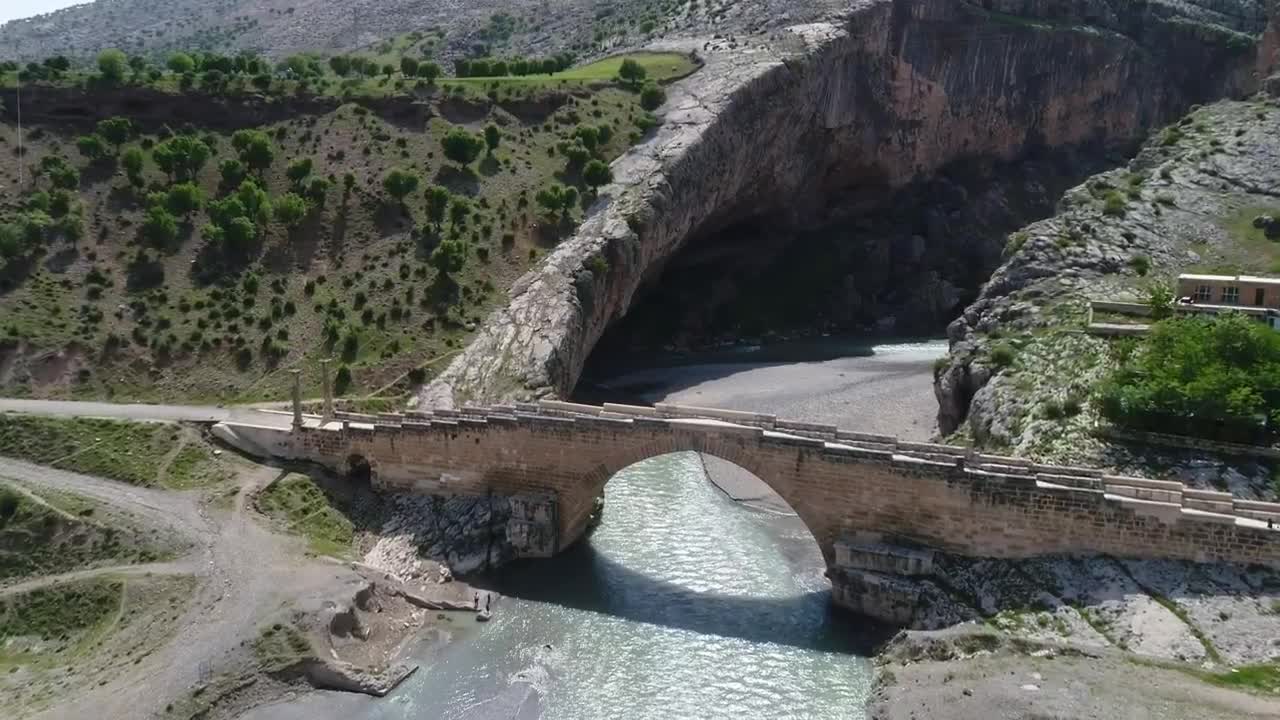 Stock Video Old Stone Bridge Across A River Live Wallpaper