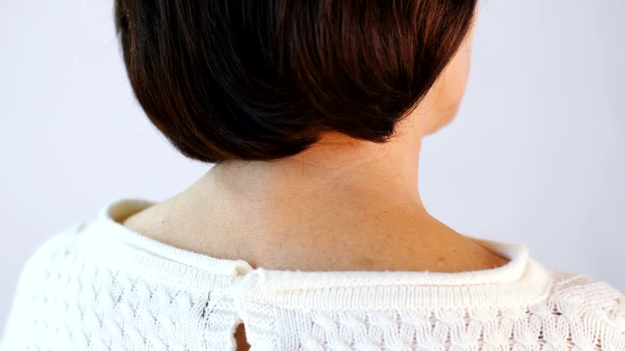 Stock Video Old Woman With Tension In Her Neck Live Wallpaper