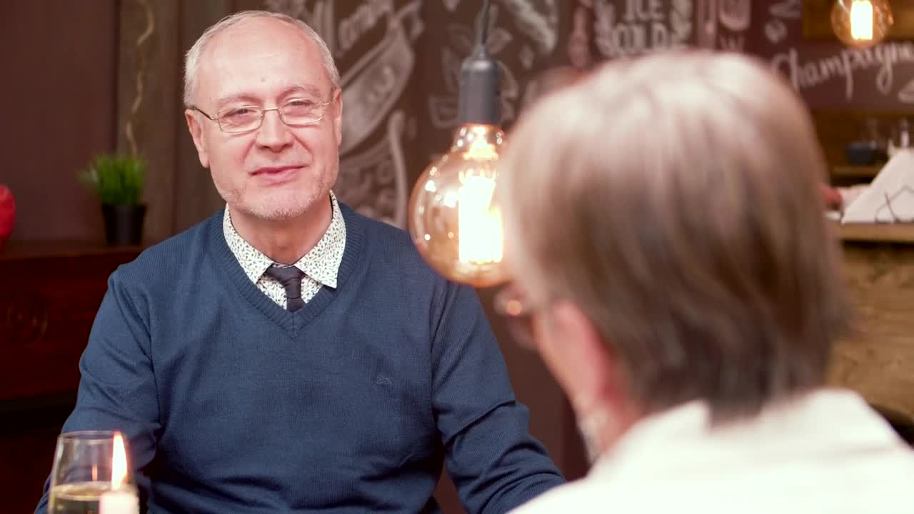 Stock Video Older Man Chats About Wedding And Proposes On Dinner Date Live Wallpaper