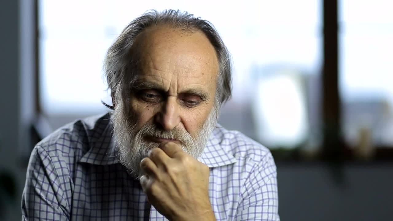 Stock Video Older Man Deep In Thought Live Wallpaper