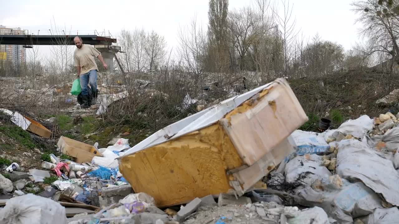 Stock Video Older Man Searching A Waste Site Live Wallpaper