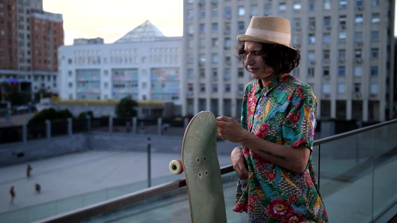 Stock Video Older Skater Using A Phone Live Wallpaper