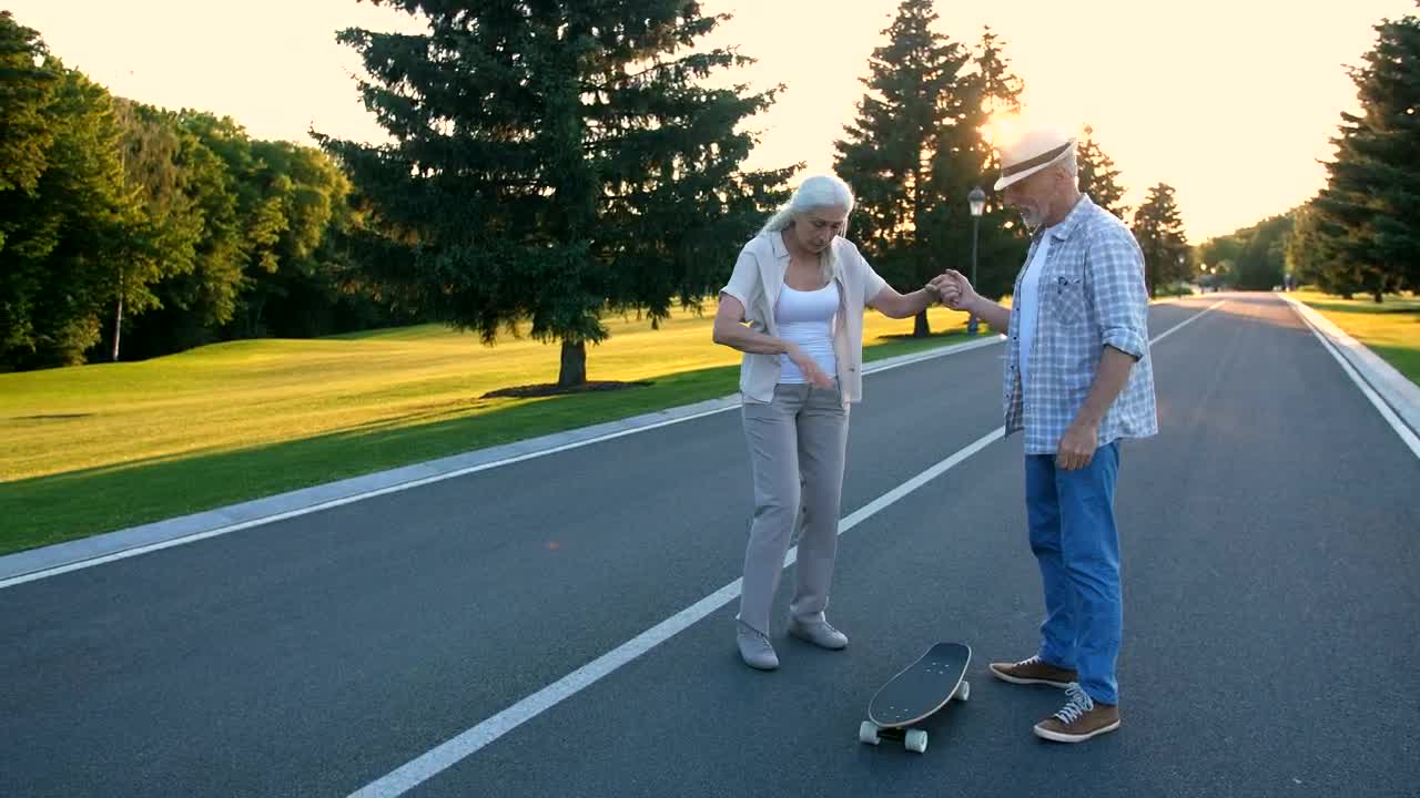 Stock Video Older Woman Learning To Skate Live Wallpaper