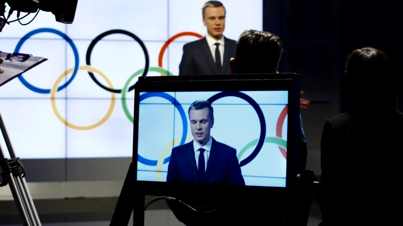 Stock Video Olympics Spokesman In A Television Show Live Wallpaper