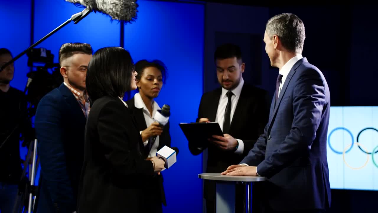 Stock Video Olympics Spokesman Talking To Journalists Live Wallpaper
