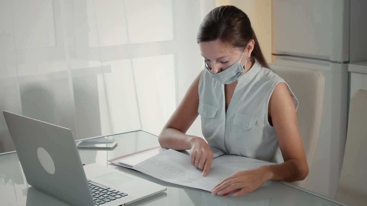 Stock Video On A Digital Meeting At Home With A Face Mask Live Wallpaper
