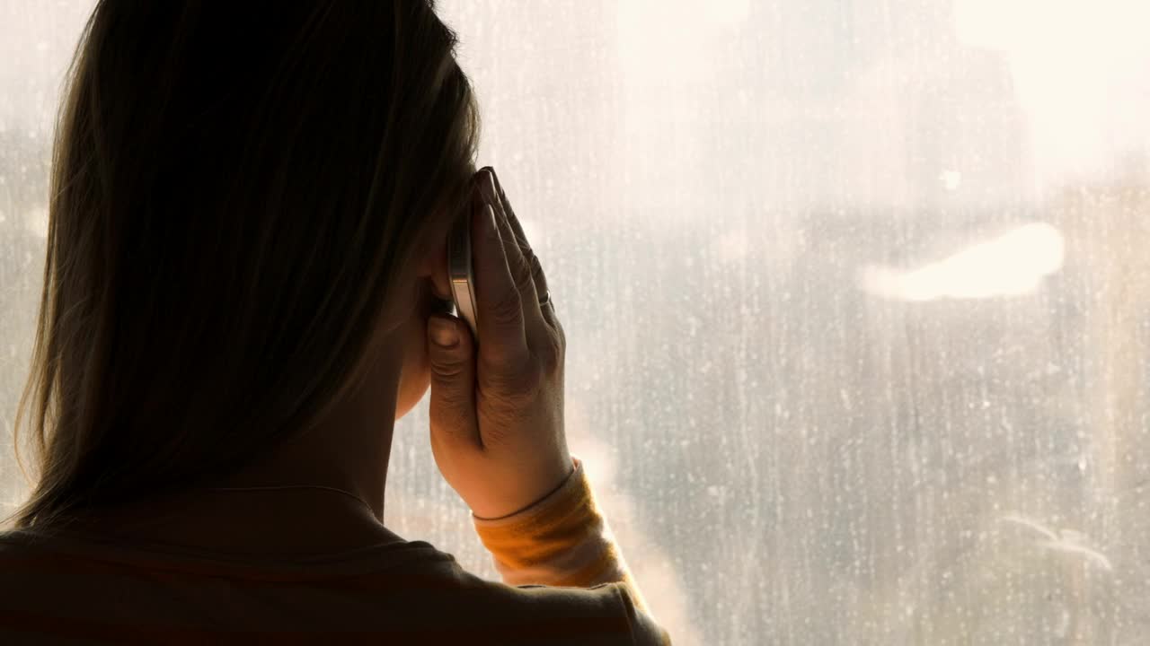 Stock Video On The Phone By A Window Live Wallpaper