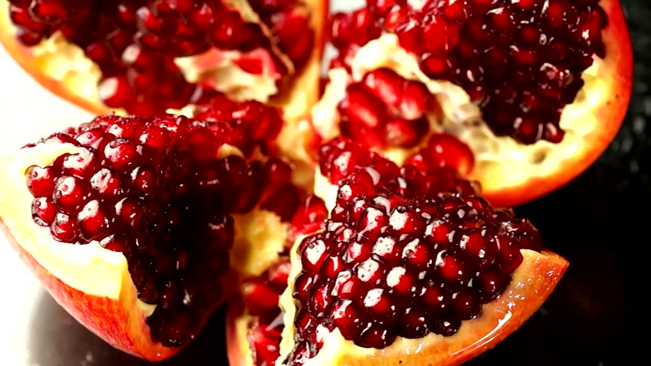 Stock Video Open Pomegranate Rotating Live Wallpaper