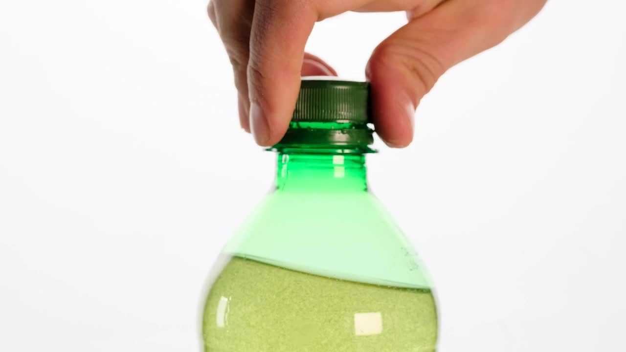 Stock Video Opening A Bottle Soda Bursting With Foam Live Wallpaper