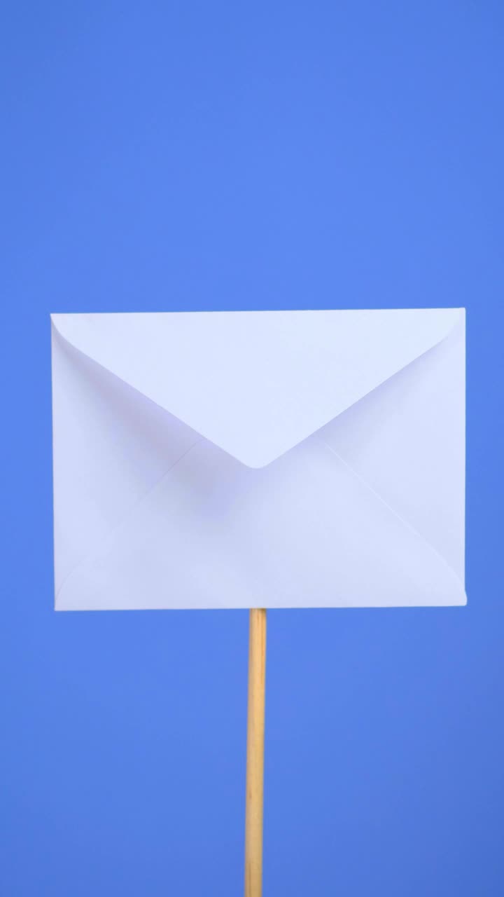 Stock Video Opening A White Envelope On A Blue Background Live Wallpaper