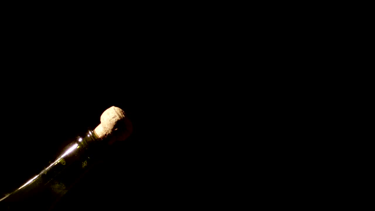 Stock Video Opening Champagne In The Dark Live Wallpaper