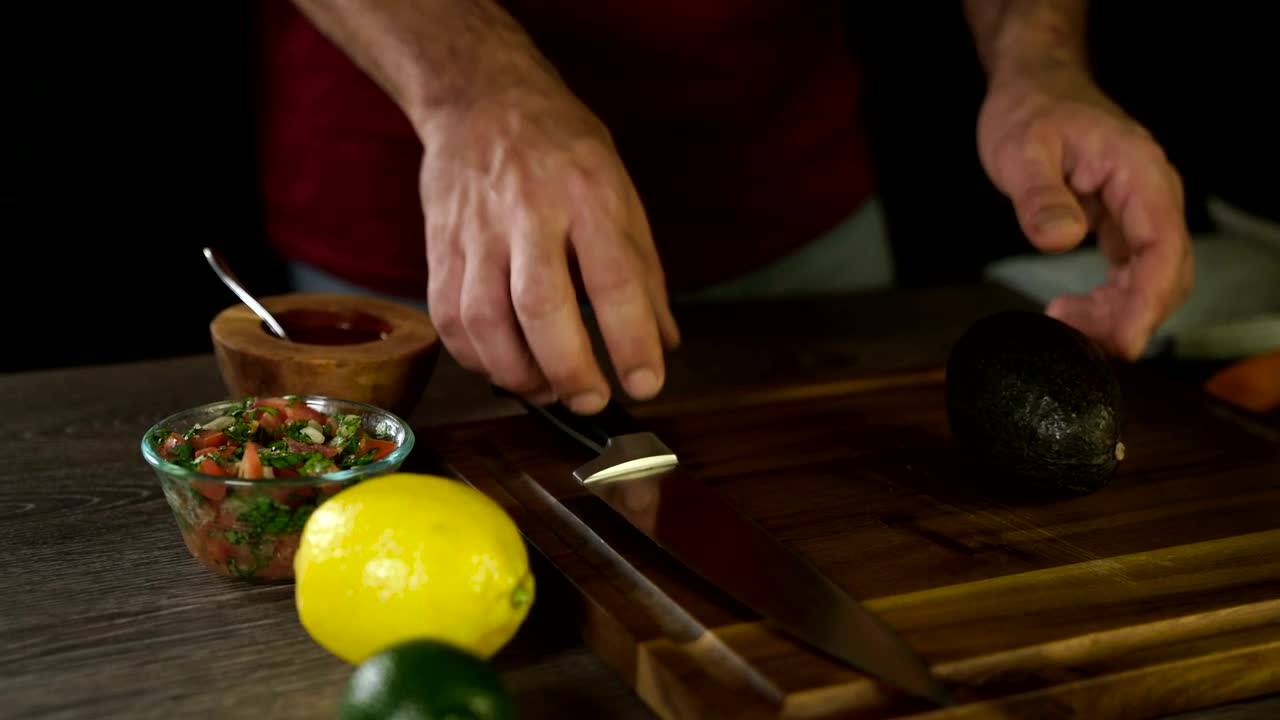 Stock Video Opening Up An Avocado Live Wallpaper