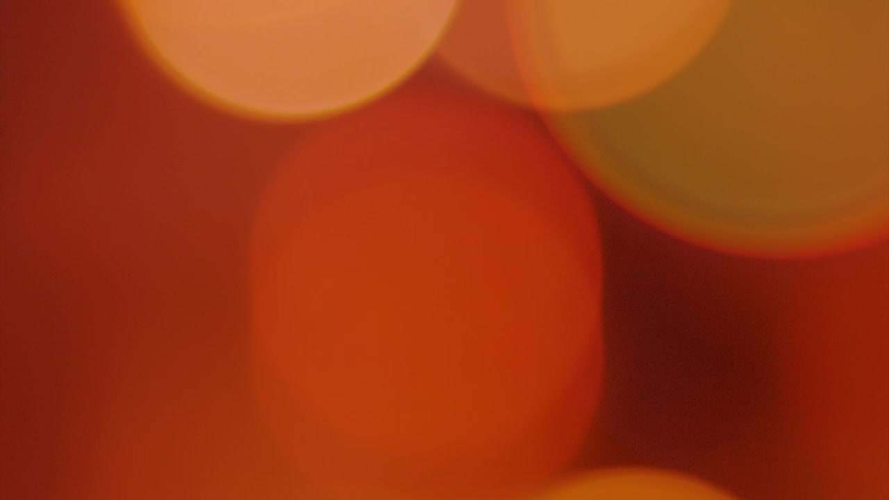 Stock Video Orange Circular Lights Move Vertically Live Wallpaper