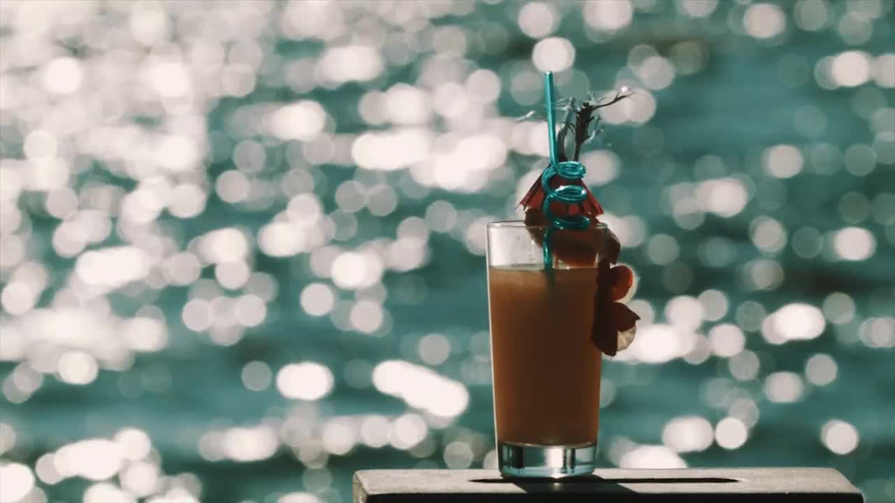 Stock Video Orange Cocktail With Decorations Live Wallpaper
