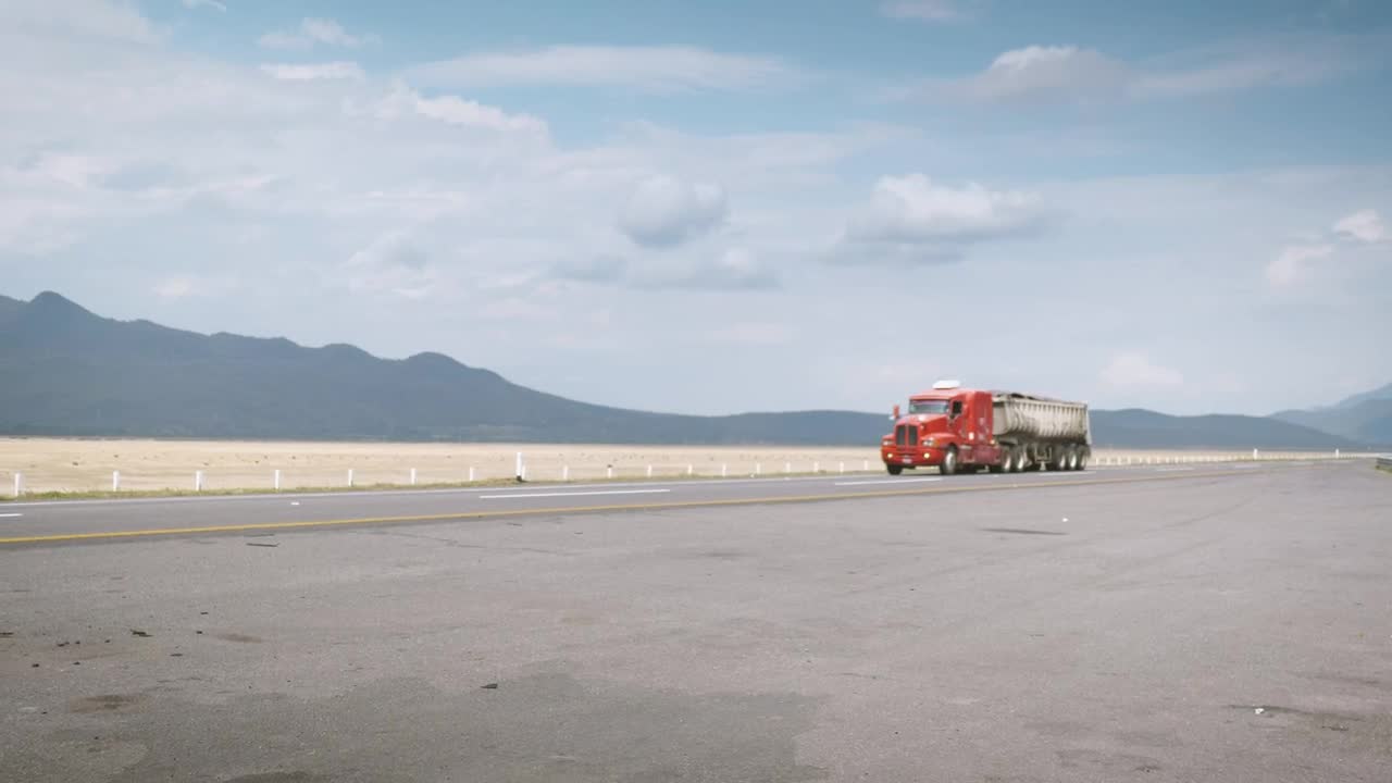 Stock Video Orange Heavy Cargo Transport Moving On The Road Live Wallpaper