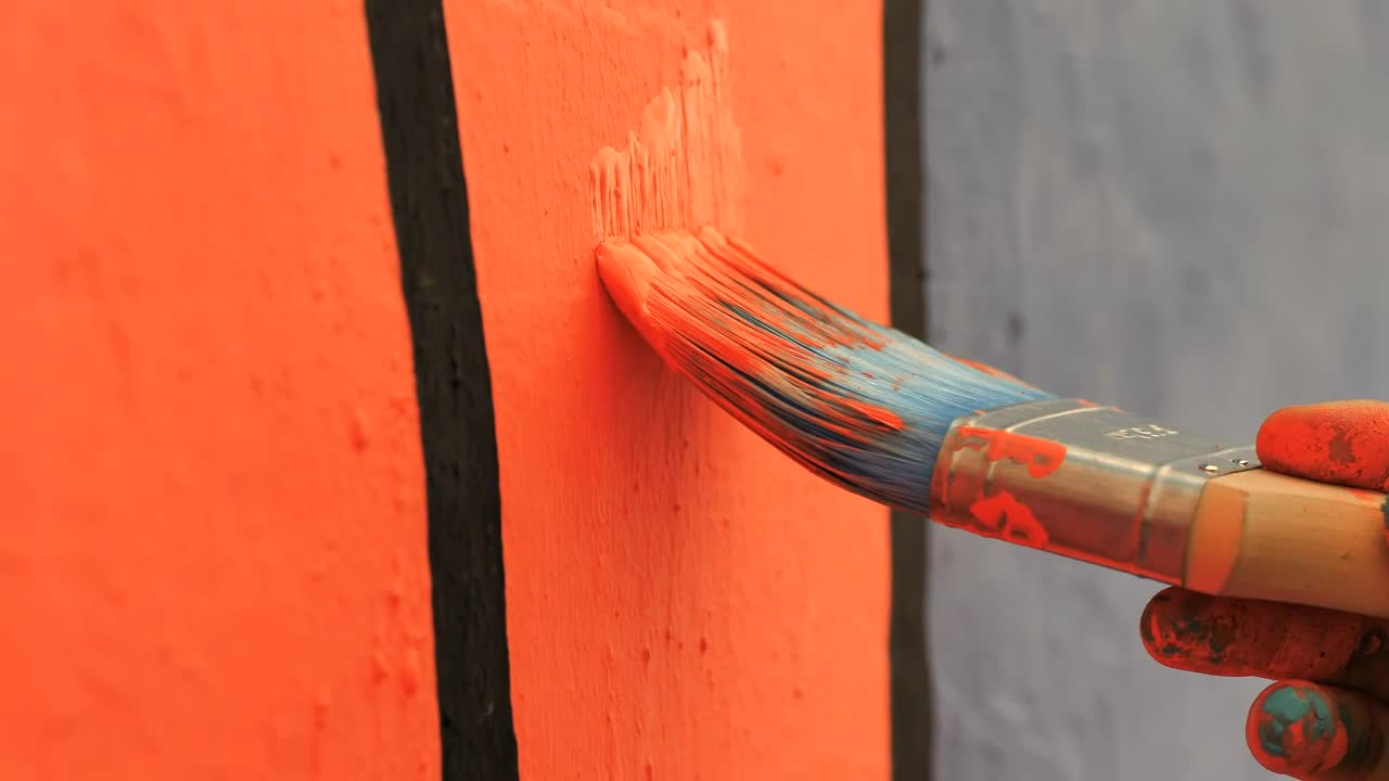Stock Video Orange Paint On A Mural Live Wallpaper